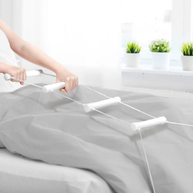 rope ladder bed hoist in use