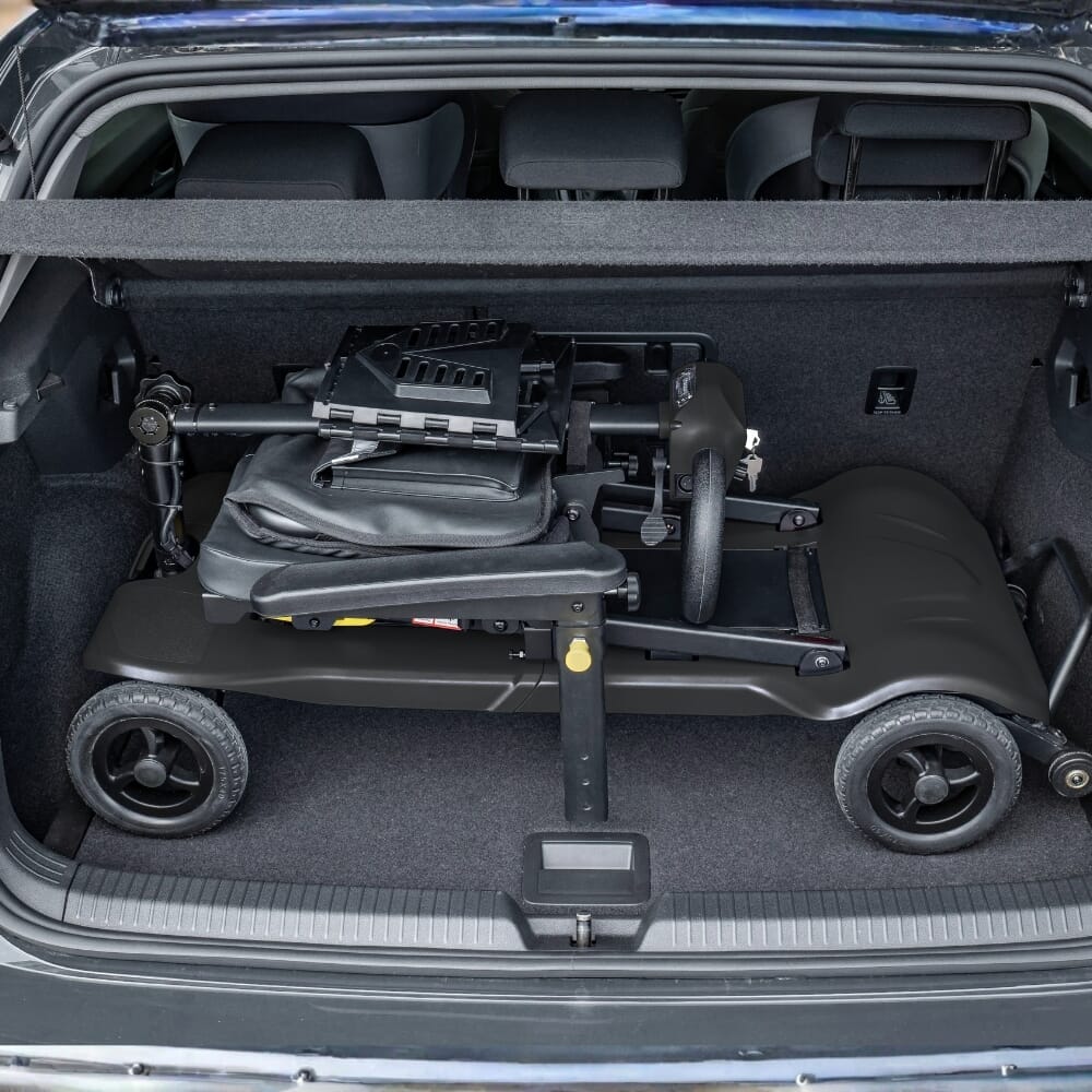 scooterpac atom fold mobility scooter black in back of car
