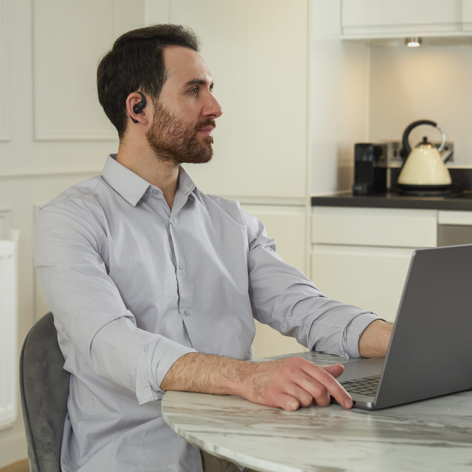 shokz openfit earbuds black laptop