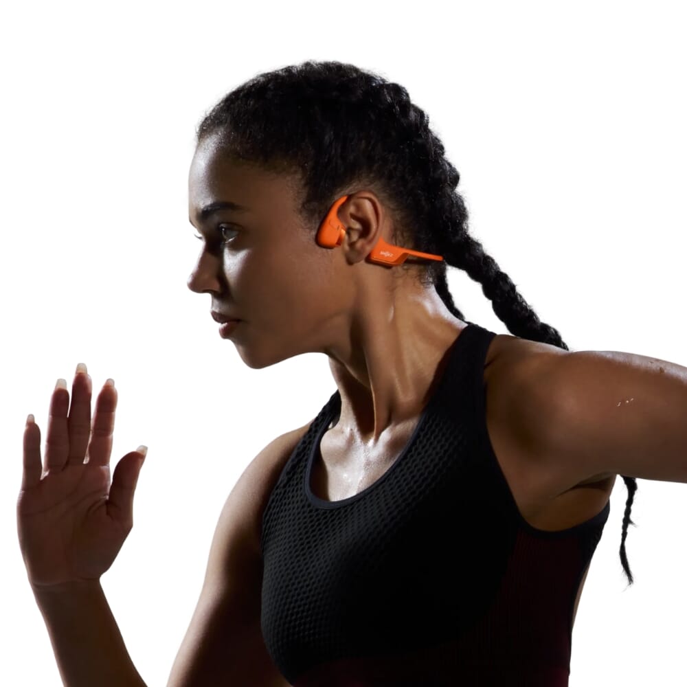 shokz openrun pro 2 headphones black orange lifestyle