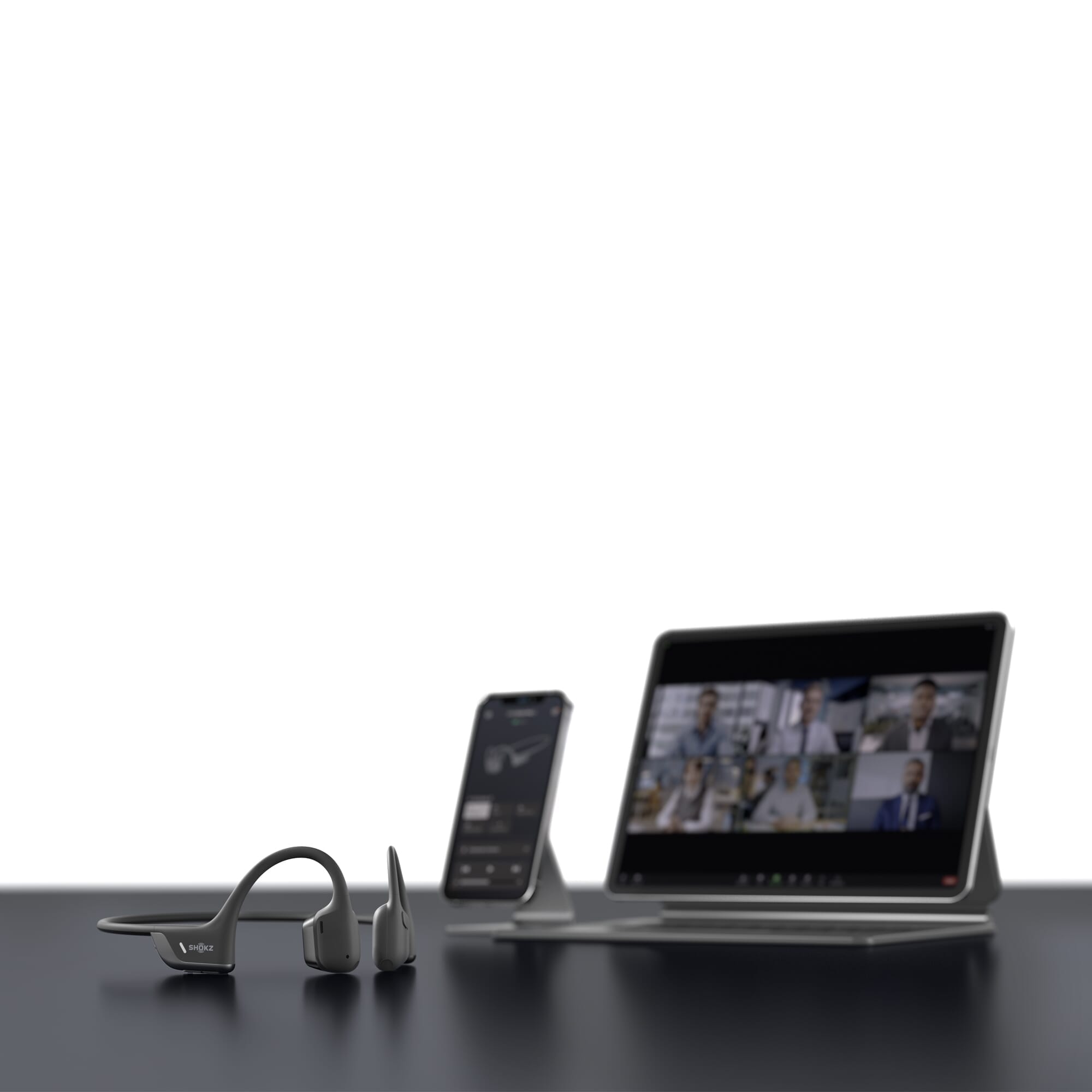 shokz openrun pro 2 headphones laptop and phone