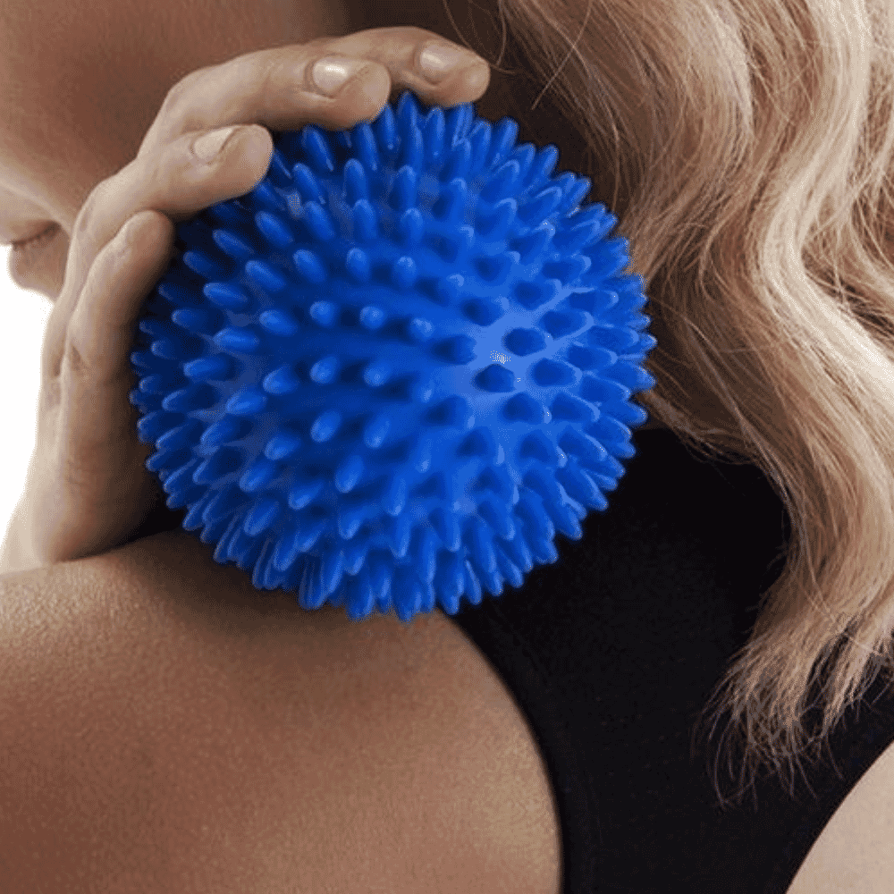 spiky massage ball in use