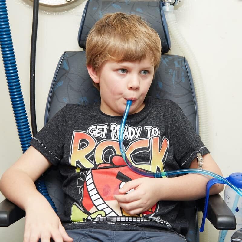 the hydrant in use by a child