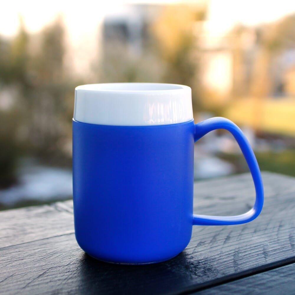 thermo mug blue shown on table