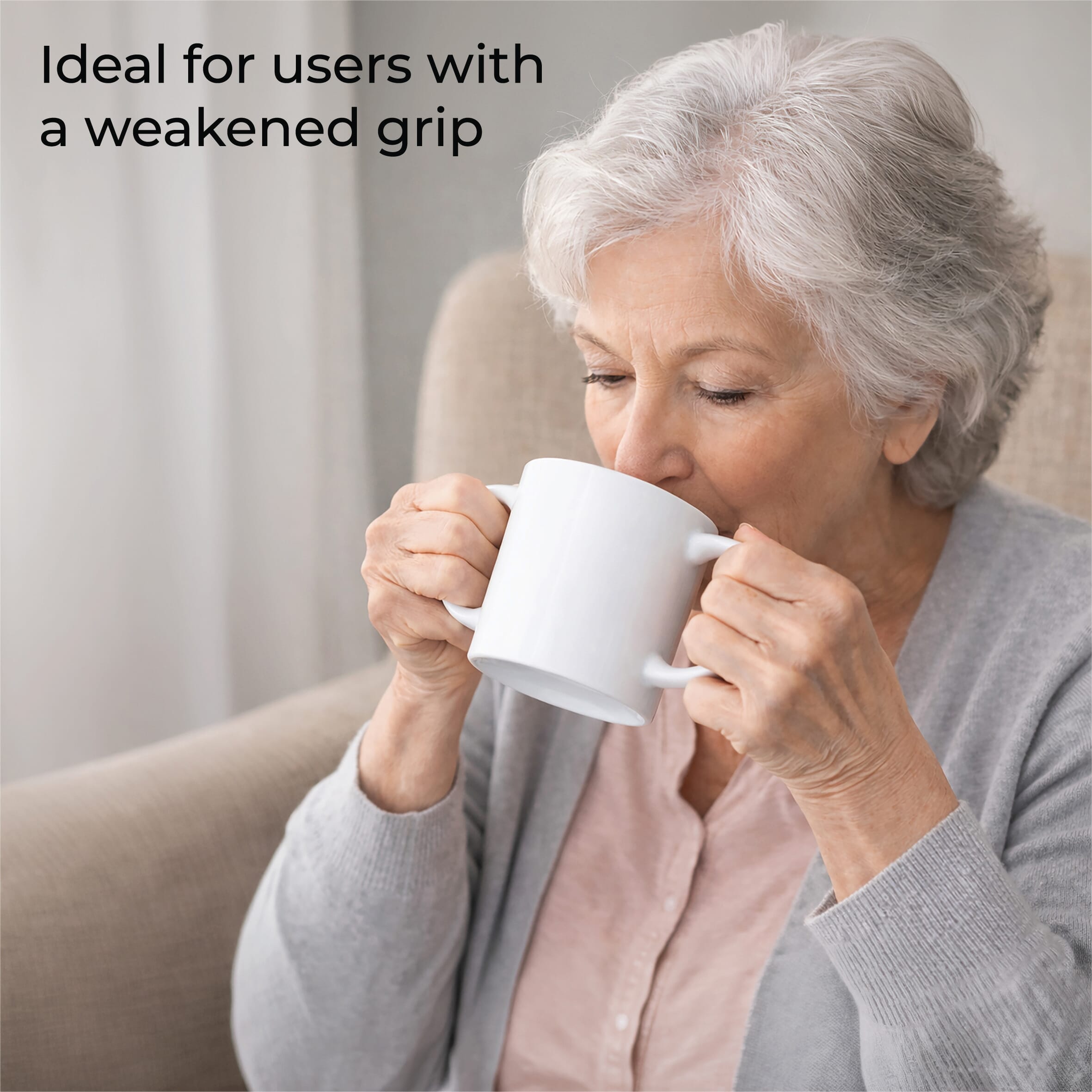 two handled drinking mug in use
