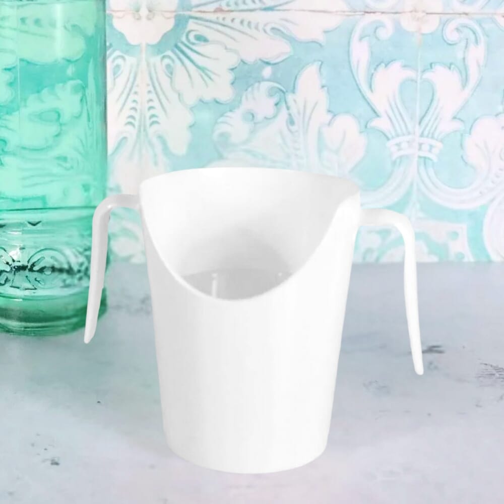 two handled nose cup white in use