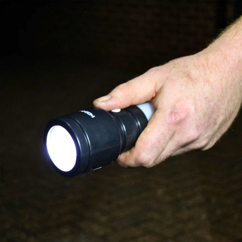 uni com rechargeable torch and lantern held as torch