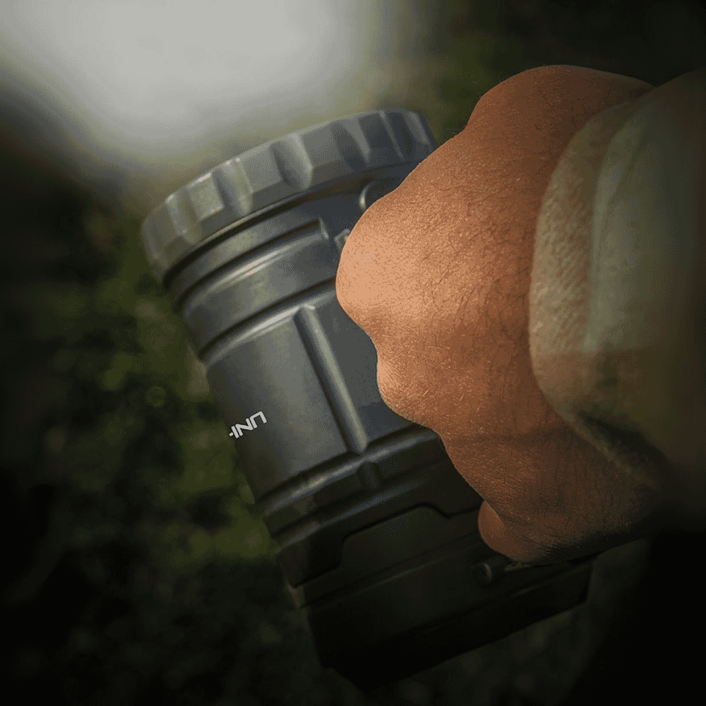 uni com spotlight and lantern in use