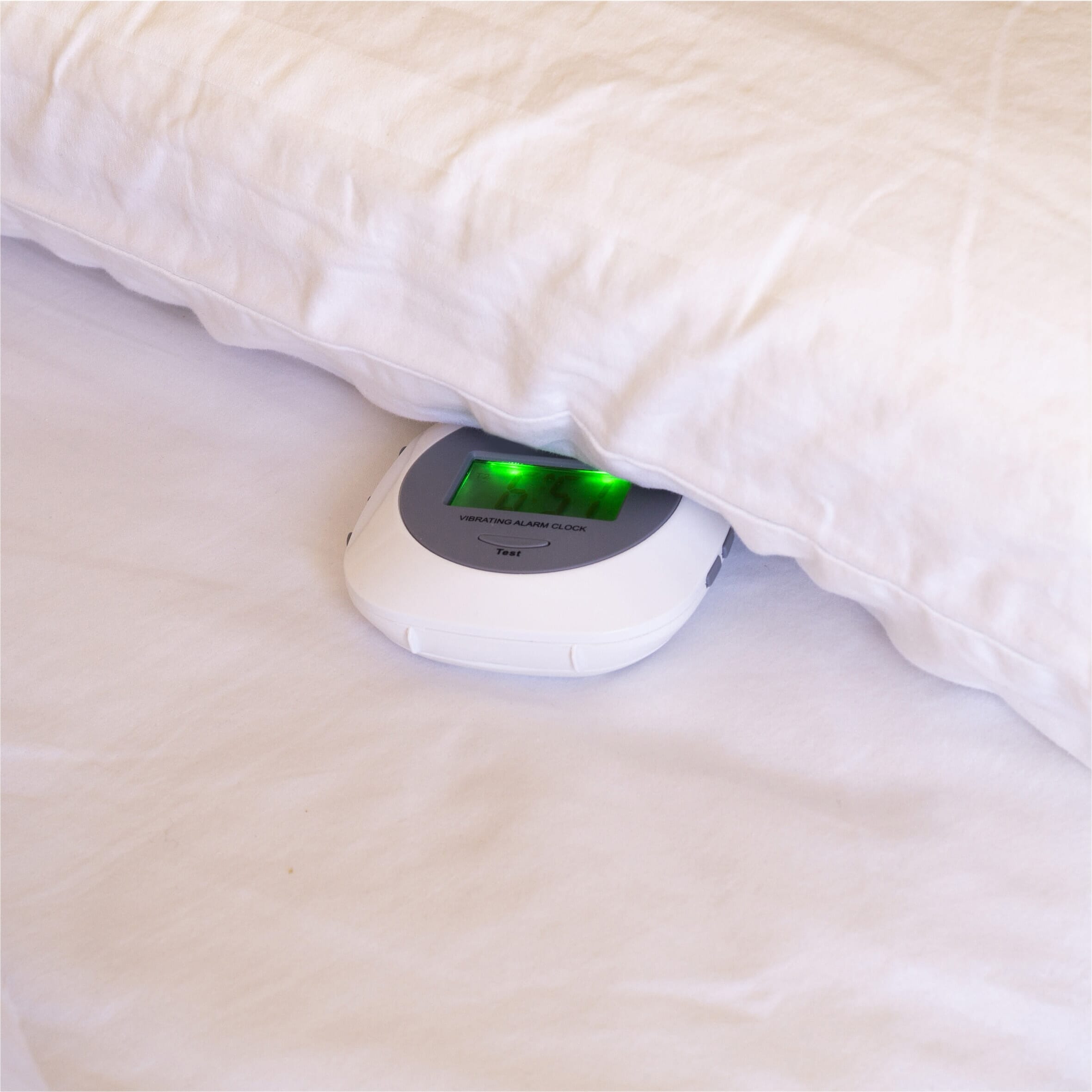 vibrating alarm clock in use