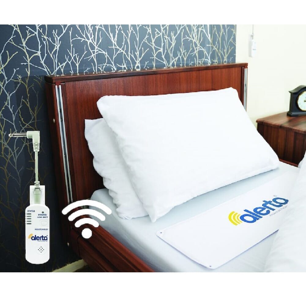 wireless bed alert mat shown in care setting