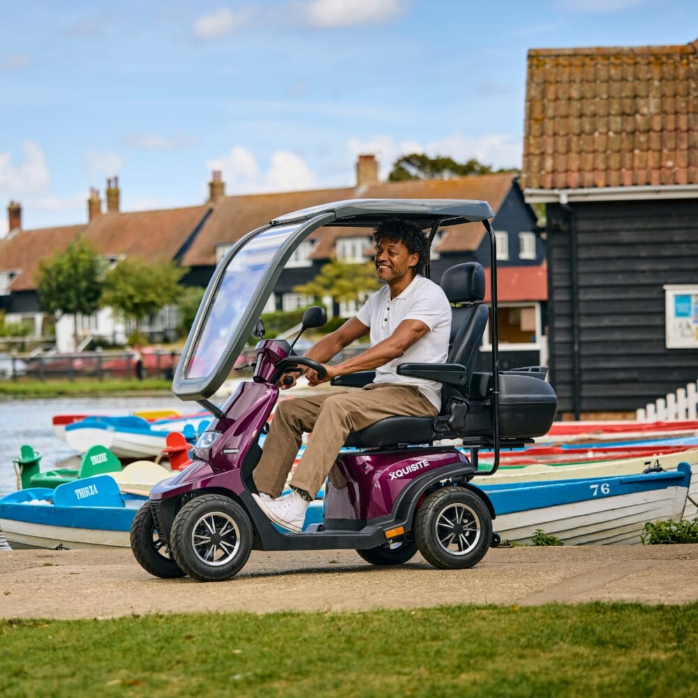 xquisite mobility scooter plum with canopy lifestyle