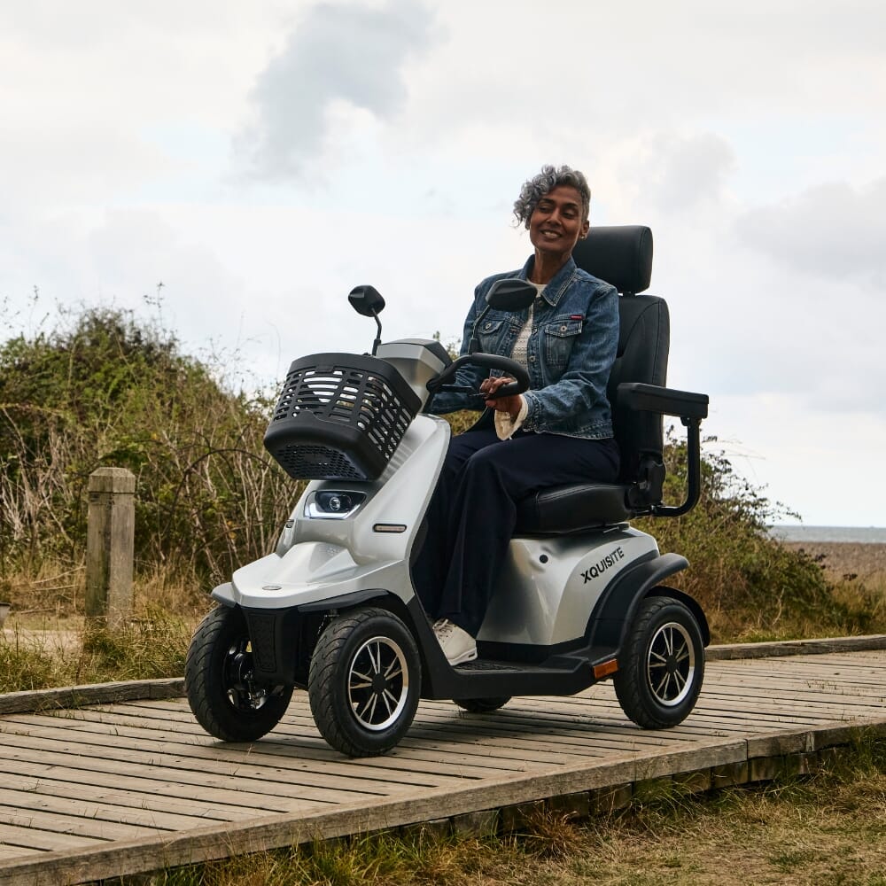 xquisite mobility scooter silver in use